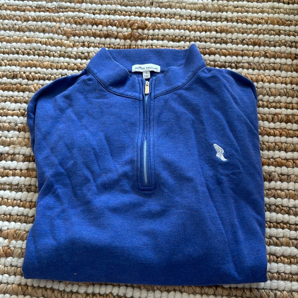 blue Peter Millar quarter zip with New York athletic club logo